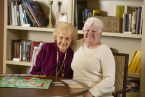Two Ladies Playing Board Games | St. Anthony's Senior Living