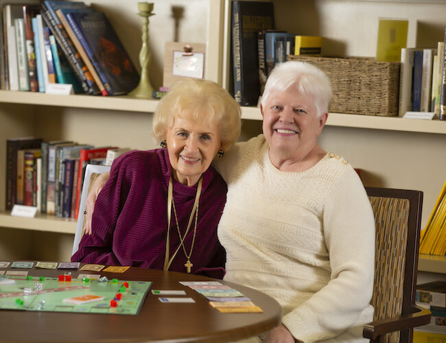Two Ladies Playing Board Games | St. Anthony's Senior Living