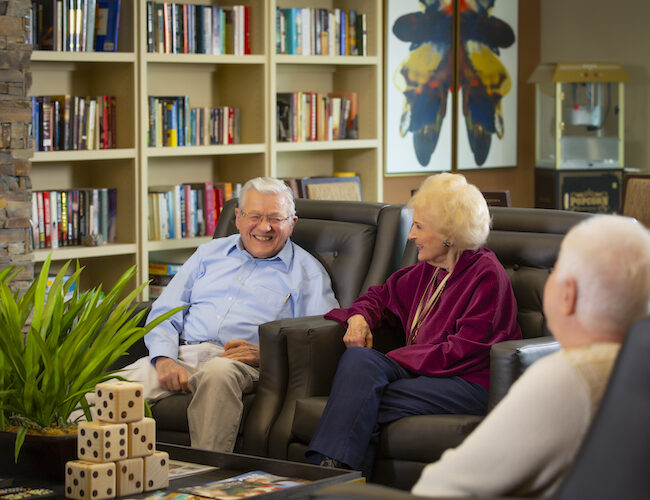 Senior Living Couple on Couch | St. Anthony's Senior Living